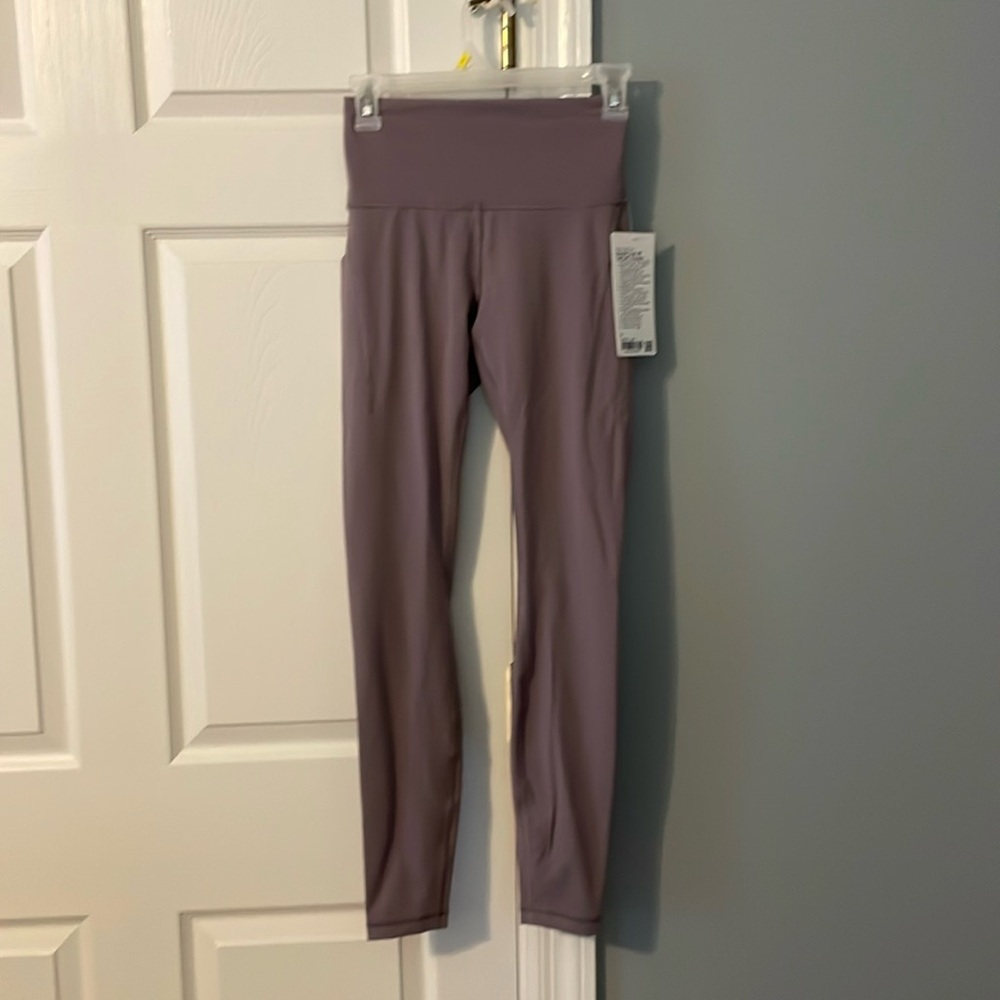 New with tags Lululemon wunder train HR tight 28” pockets in purple